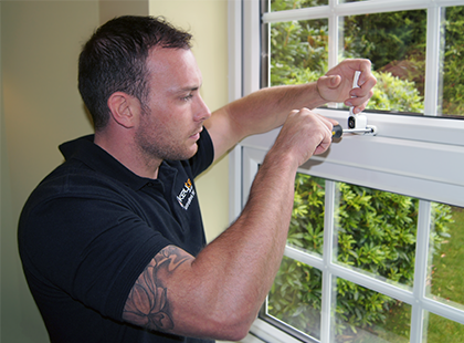 keytek locksmith working on upvc window